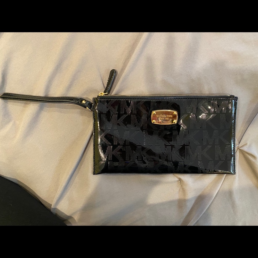 BRAND NEW — black glossy MK clutch